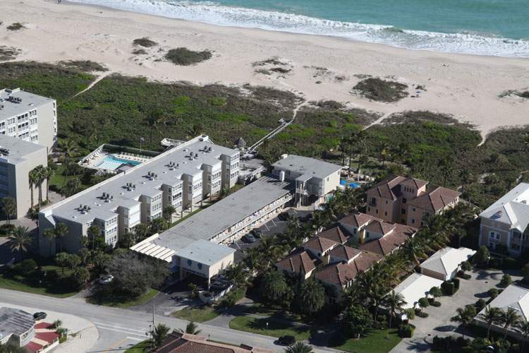 View of hotel at an angle with beach in the background